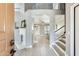 Spacious foyer with a view of the dining room, and stairs leading to the second level at 6938 W Wescott Dr, Glendale, AZ 85308