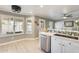 Bright kitchen featuring stainless steel appliances, a breakfast bar, and eat-in dining area at 6938 W Wescott Dr, Glendale, AZ 85308