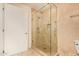 Bathroom shower with glass doors and tiled walls at 7117 E Rancho Vista Dr # 2003, Scottsdale, AZ 85251