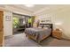 Cozy bedroom with tray ceiling, large windows and neutral tones at 7117 E Rancho Vista Dr # 2003, Scottsdale, AZ 85251