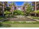 Beautiful courtyard view with water feature, lush landscaping and multi-story building at 7117 E Rancho Vista Dr # 2003, Scottsdale, AZ 85251