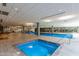 Bright indoor pool with adjoining fitness center and large windows at 7117 E Rancho Vista Dr # 2003, Scottsdale, AZ 85251