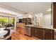 Open concept kitchen with stainless appliances and breakfast bar overlooks living space at 7117 E Rancho Vista Dr # 2003, Scottsdale, AZ 85251