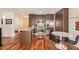 The kitchen has stainless steel appliances, wood cabinets and granite countertops at 7117 E Rancho Vista Dr # 2003, Scottsdale, AZ 85251