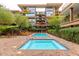 Resort-style pool area with hot tub and luxurious lounge seating at 7117 E Rancho Vista Dr # 2003, Scottsdale, AZ 85251