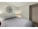 Bright bedroom with closet space and decorative wall art for a personal touch at 7302 E Baseline Rd, Mesa, AZ 85209
