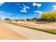 Community with sidewalk and desert landscaping, offering a serene outdoor environment at 7302 E Baseline Rd, Mesa, AZ 85209