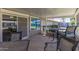 Enclosed patio with tile flooring provides great space for outdoor seating at 10449 W Tropicana Cir, Sun City, AZ 85351