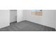 Clean bedroom design showing gray carpet, white walls, a window and a closet at 10912 E Tiburon Ave, Mesa, AZ 85212