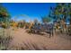 Community park with bench seating and landscaping at 10912 E Tiburon Ave, Mesa, AZ 85212