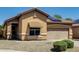 Charming single-story home with a two-car garage and well-maintained landscaping at 11664 W Eagle Ct, Surprise, AZ 85378