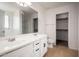 Bright bathroom with double vanity, large mirror, and walk-in shower at 1222 E Canyon Trl, San Tan Valley, AZ 85143