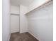 Walk-in closet with carpet and a sturdy wooden clothing rod and shelf at 1222 E Canyon Trl, San Tan Valley, AZ 85143