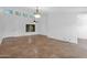 Bright living room featuring high ceilings, tile flooring, and plentiful natural light from clerestory windows at 1308 E Rosemonte Dr, Phoenix, AZ 85024