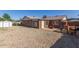 Aerial view of the backyard featuring low maintenance landscaping and a storage shed at 1348 W Rockwood Dr, Phoenix, AZ 85027