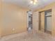 Bedroom has neutral carpet, a window and mirrored closet doors at 1348 W Rockwood Dr, Phoenix, AZ 85027