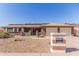 Charming single-story home featuring a two-car garage, solar panels, and low-maintenance landscaping at 1348 W Rockwood Dr, Phoenix, AZ 85027