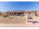 Charming single-story home featuring a two-car garage, solar panels, and low-maintenance landscaping at 1348 W Rockwood Dr, Phoenix, AZ 85027
