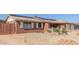 Features an expansive driveway and low-maintenance desert landscaping, adding to its curb appeal at 1348 W Rockwood Dr, Phoenix, AZ 85027