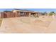 Features an expansive driveway and low-maintenance desert landscaping, adding to its curb appeal at 1348 W Rockwood Dr, Phoenix, AZ 85027