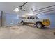 Spacious garage features high ceilings and ample room for parking and storage at 1348 W Rockwood Dr, Phoenix, AZ 85027