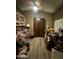 Open-concept living area featuring hard wood floors, high ceilings, and natural light at 14878 W Verde Ln, Goodyear, AZ 85395