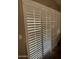 Modern home interior showcasing window shutters that let in natural light at 14878 W Verde Ln, Goodyear, AZ 85395