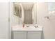 Cozy bathroom featuring white vanity with sink, and a mirrored wall cabinet at 16036 N 11Th Ave # 1086, Phoenix, AZ 85023