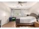 Bedroom featuring neutral walls, ceiling fan, and laminate wood flooring at 16036 N 11Th Ave # 1086, Phoenix, AZ 85023