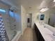 Bright bathroom featuring double sinks, modern fixtures, and ample counter space at 1718 S 82Nd Way, Mesa, AZ 85209