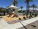 Community playground with a slide and shade at 1718 S 82Nd Way, Mesa, AZ 85209
