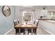 Cozy dining area with modern table, chairs, and natural lighting at 18555 N 114Th Ave, Surprise, AZ 85378