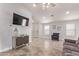 Bright living area featuring neutral decor, tile flooring, and an open layout at 18555 N 114Th Ave, Surprise, AZ 85378