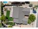 An aerial view of the property highlighting the roof and backyard at 18823 N 97Th Ln, Peoria, AZ 85382