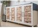 Stylish cabinet with a unique wood mosaic design and ample storage space at 18823 N 97Th Ln, Peoria, AZ 85382