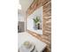 Close-up of kitchen details showing wood accents, modern countertops, and stylish finishes for a unique aesthetic at 18823 N 97Th Ln, Peoria, AZ 85382