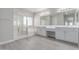 Bright bathroom with double vanity, soaking tub, glass shower, and modern finishes at 18868 E Canary Way, Queen Creek, AZ 85142