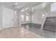 Inviting foyer with a staircase, high ceilings and a combination of tiled and wood floors at 18868 E Canary Way, Queen Creek, AZ 85142