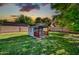 Charming playhouse nestled in a green backyard, perfect for  at 20042 W Dunlap Rd, Buckeye, AZ 85326