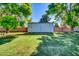 Practical storage shed in a spacious yard, ideal for storing tools and equipment at 20042 W Dunlap Rd, Buckeye, AZ 85326
