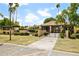 Well-maintained community clubhouse with manicured landscaping at 2116 W Marlette Ave, Phoenix, AZ 85015