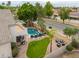An aerial view showcases the private pool, mature landscaping, and outdoor living spaces at 2218 E Anchor Dr, Gilbert, AZ 85234
