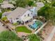 An aerial perspective highlights the property's pool, patio, and lush landscaping at 2218 E Anchor Dr, Gilbert, AZ 85234
