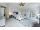 Bright bedroom with vaulted ceiling, sitting area, and carpet at 2218 E Anchor Dr, Gilbert, AZ 85234
