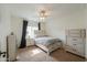 Bright bedroom featuring neutral tones, carpet, and comfortable furnishings at 2218 E Anchor Dr, Gilbert, AZ 85234