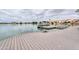 Scenic waterfront view with a dock and a boat, perfect for lake access at 2218 E Anchor Dr, Gilbert, AZ 85234