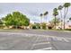 The clubhouse features a covered entry, ample parking, and mature landscaping at 2218 E Anchor Dr, Gilbert, AZ 85234