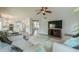 Inviting living room with comfortable sofas, large windows, and an open layout at 2218 E Anchor Dr, Gilbert, AZ 85234