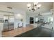 Open-concept living room adjacent to the kitchen, showcasing an inviting layout and natural light at 2218 E Anchor Dr, Gilbert, AZ 85234