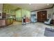 Inviting lobby area with travertine floors, seating area, and information desk at 2218 E Anchor Dr, Gilbert, AZ 85234